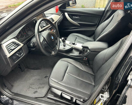 Черный БМВ 3 Серия, объемом двигателя 2 л и пробегом 142 тыс. км за 13999 $, фото 13 на Automoto.ua