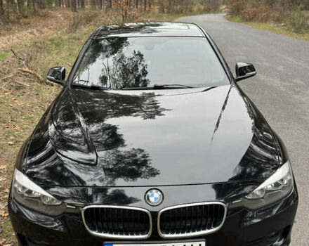 Черный БМВ 3 Серия, объемом двигателя 2 л и пробегом 143 тыс. км за 14500 $, фото 1 на Automoto.ua