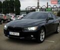 Черный БМВ 3 Серия, объемом двигателя 2 л и пробегом 180 тыс. км за 13300 $, фото 1 на Automoto.ua