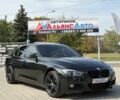Чорний БМВ 3 Серія, об'ємом двигуна 3 л та пробігом 160 тис. км за 22595 $, фото 1 на Automoto.ua