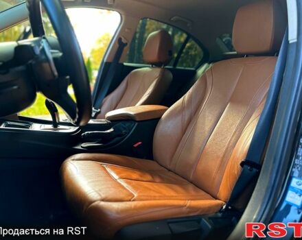 Черный БМВ 3 Серия, объемом двигателя 2 л и пробегом 225 тыс. км за 16399 $, фото 10 на Automoto.ua