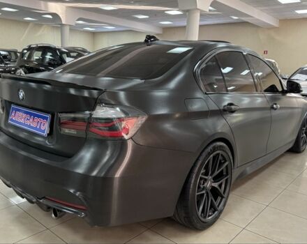 Черный БМВ 3 Серия, объемом двигателя 3 л и пробегом 145 тыс. км за 23500 $, фото 7 на Automoto.ua