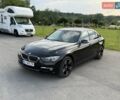 Черный БМВ 3 Серия, объемом двигателя 2 л и пробегом 200 тыс. км за 13500 $, фото 1 на Automoto.ua