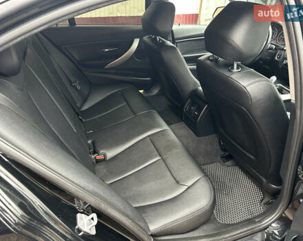 Черный БМВ 3 Серия, объемом двигателя 2 л и пробегом 142 тыс. км за 13999 $, фото 18 на Automoto.ua