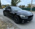 Черный БМВ 3 Серия, объемом двигателя 2 л и пробегом 128 тыс. км за 13000 $, фото 6 на Automoto.ua