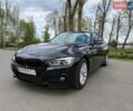 Чорний БМВ 3 Серія, об'ємом двигуна 2 л та пробігом 173 тис. км за 14500 $, фото 1 на Automoto.ua