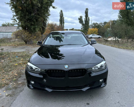 Черный БМВ 3 Серия, объемом двигателя 2 л и пробегом 128 тыс. км за 12900 $, фото 1 на Automoto.ua