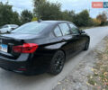 Черный БМВ 3 Серия, объемом двигателя 2 л и пробегом 128 тыс. км за 12900 $, фото 4 на Automoto.ua