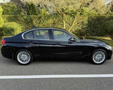 Черный БМВ 3 Серия, объемом двигателя 2 л и пробегом 128 тыс. км за 15500 $, фото 1 на Automoto.ua