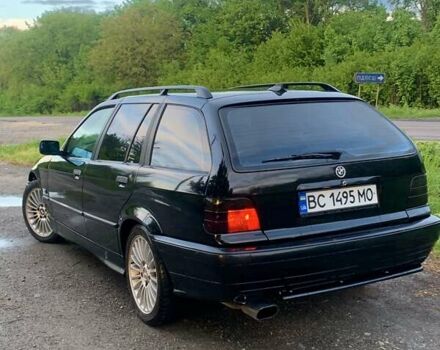 Чорний БМВ 3 Серія, об'ємом двигуна 1.8 л та пробігом 306 тис. км за 3450 $, фото 9 на Automoto.ua