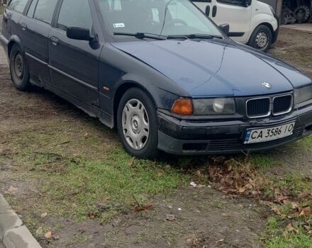 Черный БМВ 3 Серия, объемом двигателя 1.7 л и пробегом 370 тыс. км за 1600 $, фото 1 на Automoto.ua