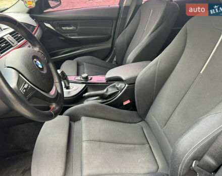 Черный БМВ 3 Серия, объемом двигателя 2 л и пробегом 330 тыс. км за 10999 $, фото 12 на Automoto.ua