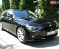 Чорний БМВ 3 Серія, об'ємом двигуна 2 л та пробігом 328 тис. км за 10990 $, фото 1 на Automoto.ua