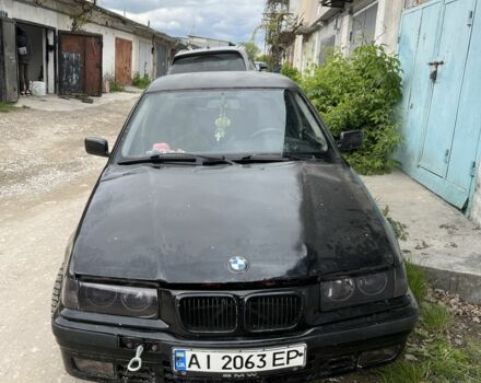Черный БМВ 3 Серия, объемом двигателя 2.5 л и пробегом 500 тыс. км за 1000 $, фото 1 на Automoto.ua