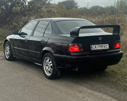 Черный БМВ 3 Серия, объемом двигателя 2 л и пробегом 410 тыс. км за 2800 $, фото 1 на Automoto.ua