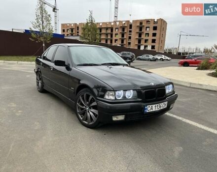 Черный БМВ 3 Серия, объемом двигателя 1.6 л и пробегом 385 тыс. км за 4000 $, фото 1 на Automoto.ua