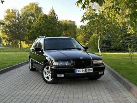 Черный БМВ 3 Серия, объемом двигателя 1.8 л и пробегом 320 тыс. км за 4200 $, фото 1 на Automoto.ua