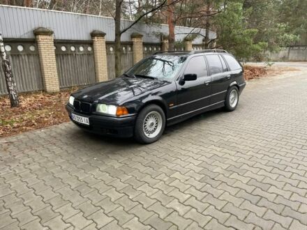 Черный БМВ 3 Серия, объемом двигателя 1.6 л и пробегом 400 тыс. км за 3500 $, фото 1 на Automoto.ua