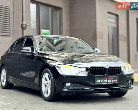 Чорний БМВ 3 Серія, об'ємом двигуна 2 л та пробігом 216 тис. км за 13999 $, фото 1 на Automoto.ua
