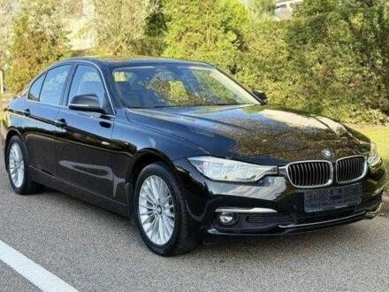 Черный БМВ 3 Серия, объемом двигателя 2 л и пробегом 128 тыс. км за 15500 $, фото 1 на Automoto.ua