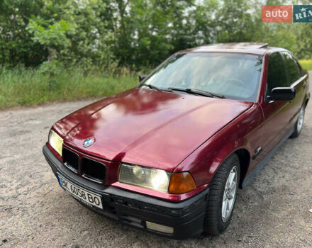 Красный БМВ 3 Серия, объемом двигателя 2.5 л и пробегом 400 тыс. км за 2600 $, фото 1 на Automoto.ua