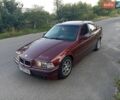Красный БМВ 3 Серия, объемом двигателя 1.8 л и пробегом 300 тыс. км за 2600 $, фото 1 на Automoto.ua