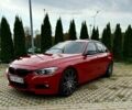 Красный БМВ 3 Серия, объемом двигателя 2 л и пробегом 243 тыс. км за 10899 $, фото 1 на Automoto.ua