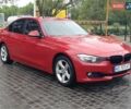 Красный БМВ 3 Серия, объемом двигателя 2 л и пробегом 180 тыс. км за 11900 $, фото 1 на Automoto.ua