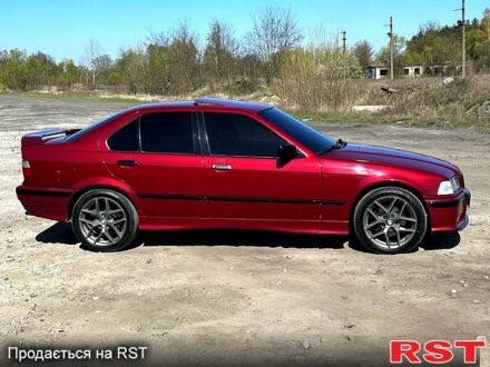 Красный БМВ 3 Серия, объемом двигателя 1.8 л и пробегом 296 тыс. км за 4600 $, фото 1 на Automoto.ua