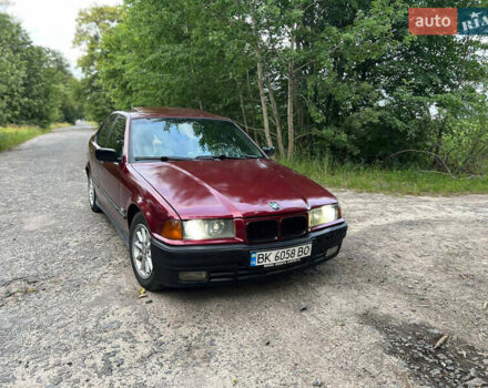 Красный БМВ 3 Серия, объемом двигателя 2.5 л и пробегом 400 тыс. км за 2600 $, фото 1 на Automoto.ua