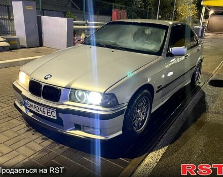 Серый БМВ 3 Серия, объемом двигателя 2.5 л и пробегом 328 тыс. км за 4000 $, фото 1 на Automoto.ua