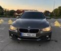 Серый БМВ 3 Серия, объемом двигателя 2 л и пробегом 135 тыс. км за 12000 $, фото 1 на Automoto.ua
