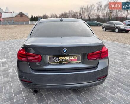 Серый БМВ 3 Серия, объемом двигателя 2 л и пробегом 180 тыс. км за 12999 $, фото 6 на Automoto.ua