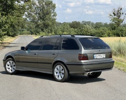 Серый БМВ 3 Серия, объемом двигателя 2.5 л и пробегом 365 тыс. км за 4000 $, фото 1 на Automoto.ua