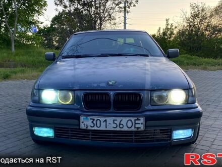 Серый БМВ 3 Серия, объемом двигателя 2.5 л и пробегом 589 тыс. км за 1599 $, фото 1 на Automoto.ua