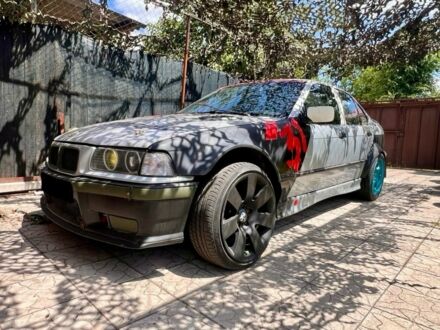 Серый БМВ 3 Серия, объемом двигателя 4 л и пробегом 10 тыс. км за 10000 $, фото 1 на Automoto.ua