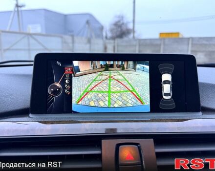 Синий БМВ 3 Серия, объемом двигателя 2 л и пробегом 14 тыс. км за 17900 $, фото 7 на Automoto.ua