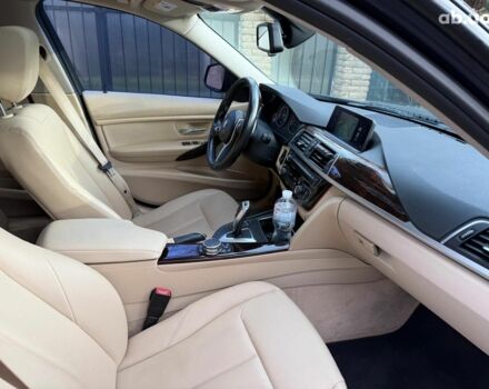 Синій БМВ 3 Серія, об'ємом двигуна 2 л та пробігом 105 тис. км за 15490 $, фото 19 на Automoto.ua