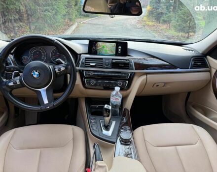 Синій БМВ 3 Серія, об'ємом двигуна 2 л та пробігом 105 тис. км за 15490 $, фото 14 на Automoto.ua
