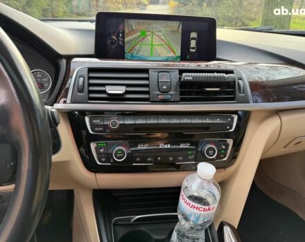 Синій БМВ 3 Серія, об'ємом двигуна 2 л та пробігом 105 тис. км за 15490 $, фото 11 на Automoto.ua