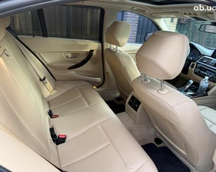 Синій БМВ 3 Серія, об'ємом двигуна 2 л та пробігом 105 тис. км за 15490 $, фото 16 на Automoto.ua