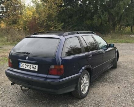 Синий БМВ 3 Серия, объемом двигателя 1.8 л и пробегом 380 тыс. км за 4000 $, фото 1 на Automoto.ua