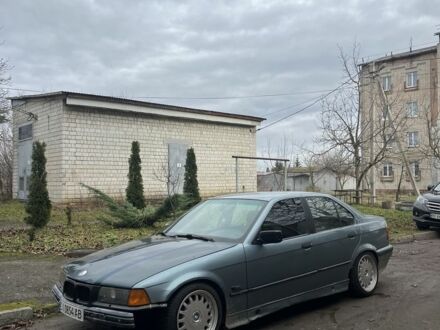 Синий БМВ 3 Серия, объемом двигателя 1.8 л и пробегом 410 тыс. км за 2100 $, фото 1 на Automoto.ua