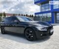 Чорний БМВ 318, об'ємом двигуна 2 л та пробігом 195 тис. км за 17600 $, фото 1 на Automoto.ua