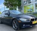 Чорний БМВ 320, об'ємом двигуна 2 л та пробігом 224 тис. км за 12900 $, фото 1 на Automoto.ua
