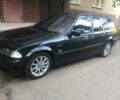 Черный БМВ 320, объемом двигателя 2 л и пробегом 350 тыс. км за 2600 $, фото 1 на Automoto.ua