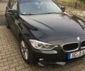 Черный БМВ 320, объемом двигателя 2 л и пробегом 206 тыс. км за 13400 $, фото 1 на Automoto.ua