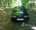 Чорний БМВ 320, об'ємом двигуна 2 л та пробігом 330 тис. км за 1390 $, фото 1 на Automoto.ua