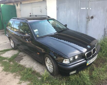 Черный БМВ 320, объемом двигателя 2 л и пробегом 160 тыс. км за 4100 $, фото 1 на Automoto.ua