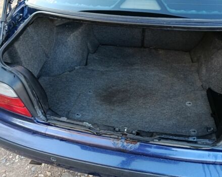 Синий БМВ 320, объемом двигателя 2 л и пробегом 300 тыс. км за 1850 $, фото 4 на Automoto.ua